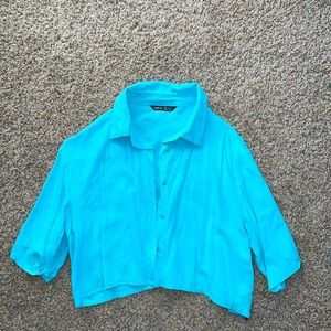 blue button up shirt